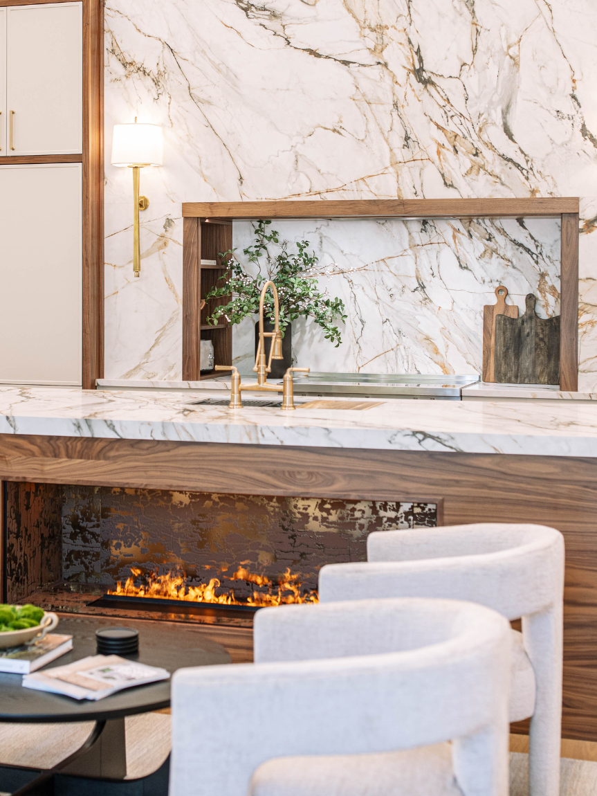 Dramatic Slab Backsplash Kitchen With Island Fireplace